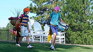 Kids golfing.