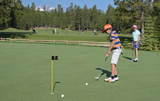 Young people putting.