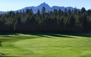 Golf course and mountain.