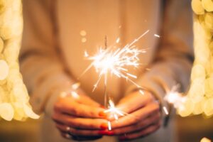 Person holding a sparkler.