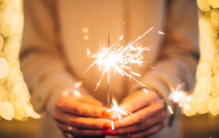 Person holding a sparkler.