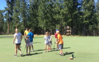 Kids golfing.