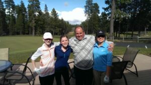 Golf students with coach.