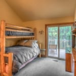 Black Butte 005 - Bedroom with bunk beds and walk-out patio