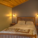 Lodge Room 030 - Bedroom with wooden furniture