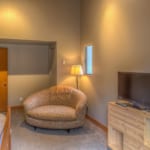Lodge Room 030 - Bedroom with chair
