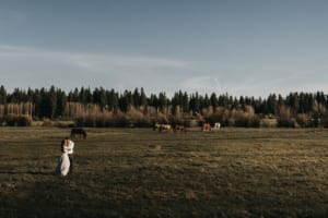 Oregon Elopement in a field with horses