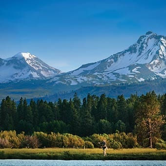 Man fly fishing .