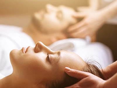 Couples getting a massage.