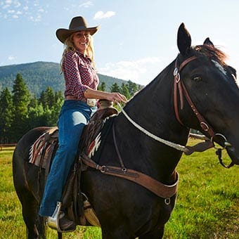 Woman on horseback.