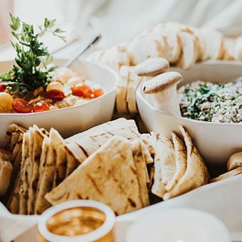 Plate of dips and crackers.