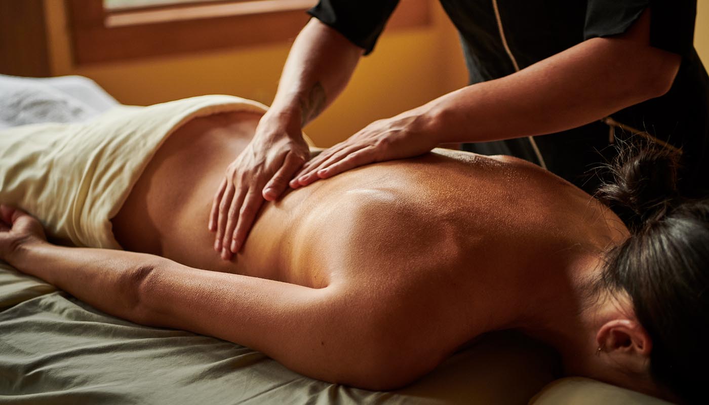 Woman receiving a professional back massage.
