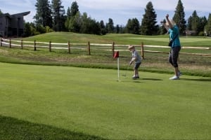 Picture of family golfing during their retreat in Oregon.