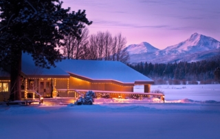 A lodge near Central Oregon cabin rentals with holiday lights.