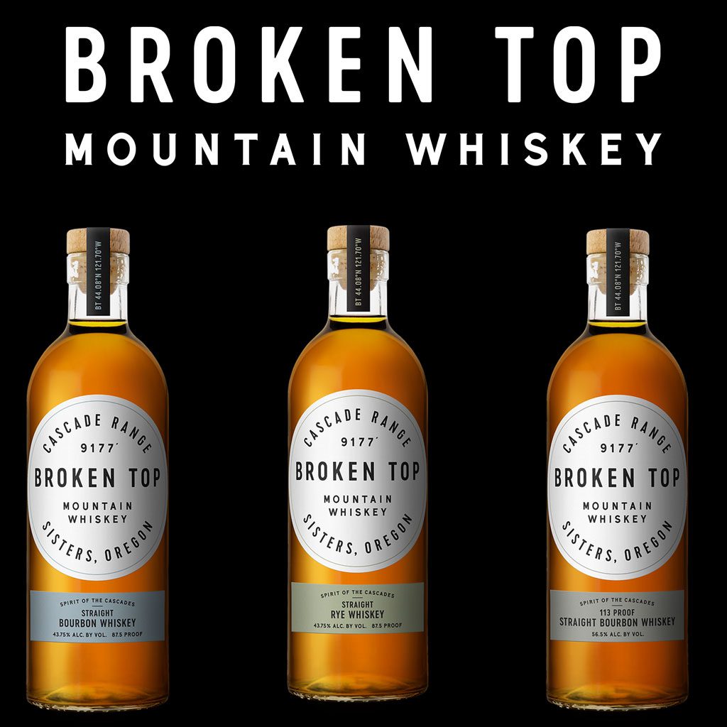 Three bottles of whiskey. Text: Broken Top Mountain Whiskey.
