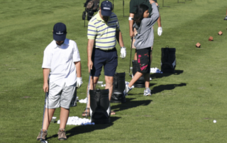 A group taking part in golf lessons at one of the best golf courses in Central Oregon.