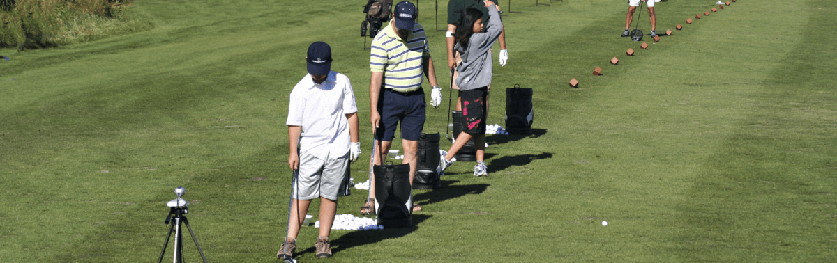 A group taking part in golf lessons at one of the best golf courses in Central Oregon.