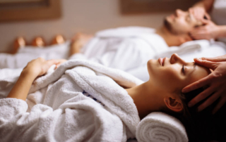 A couple getting massages on a romantic Oregon getaway.