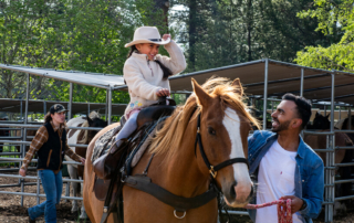 A little girl horseback riding in Oregon.