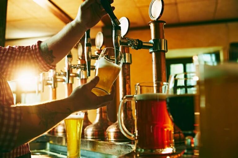 A person pouring beer at one of the breweries near Sisters, Oregon.